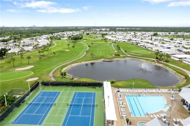 a view of a swimming pool with a garden