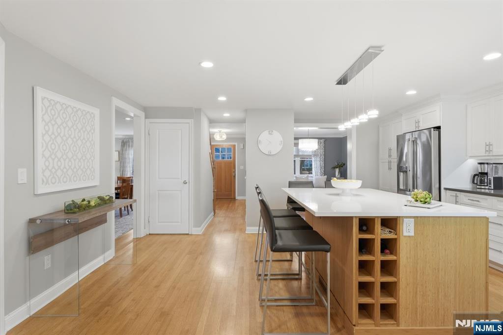89 Surrey Lane Tenafly, NJ 07670 - Photo 13 of 49 a kitchen with a table and chairs in it