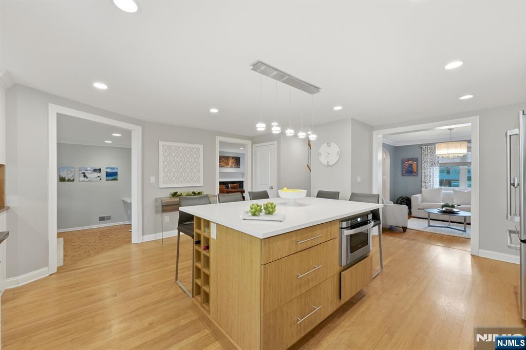 89 Surrey Lane Tenafly, NJ 07670 - Photo 14 of 49 a kitchen with a stove and a table