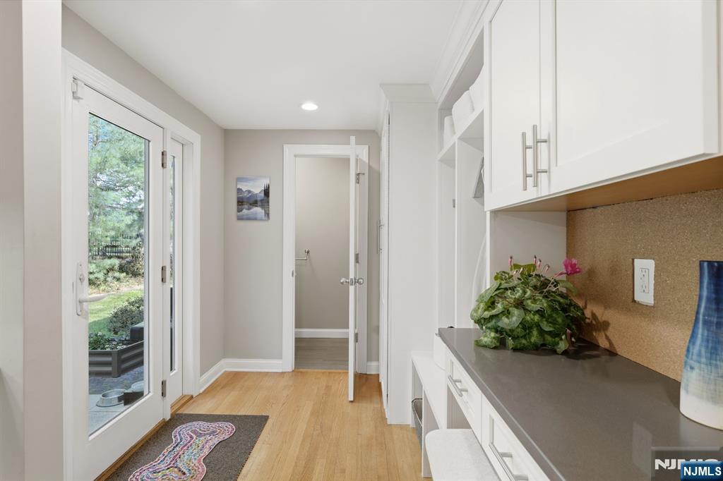 89 Surrey Lane Tenafly, NJ 07670 - Photo 17 of 49 a view of entryway with wooden floor and front door