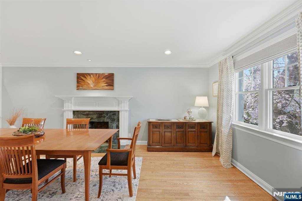 89 Surrey Lane Tenafly, NJ 07670 - Photo 22 of 49 a view of a dining room with furniture window and wooden floor