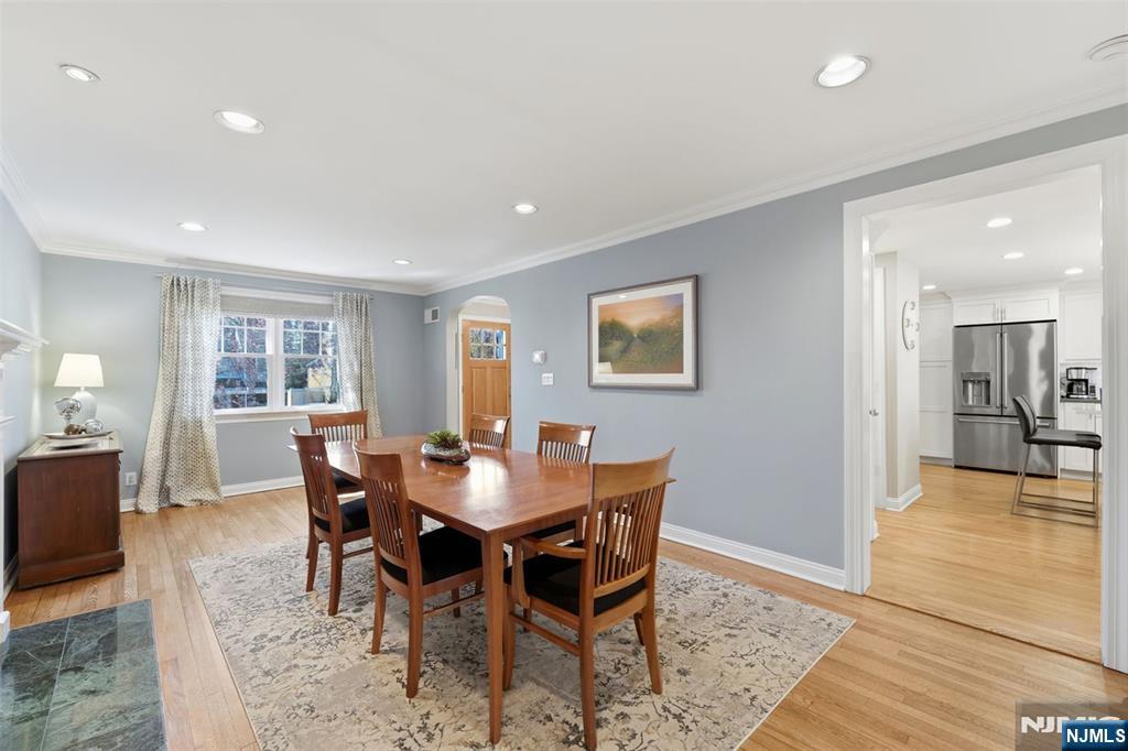89 Surrey Lane Tenafly, NJ 07670 - Photo 23 of 49 a view of a dining room with furniture and wooden floor