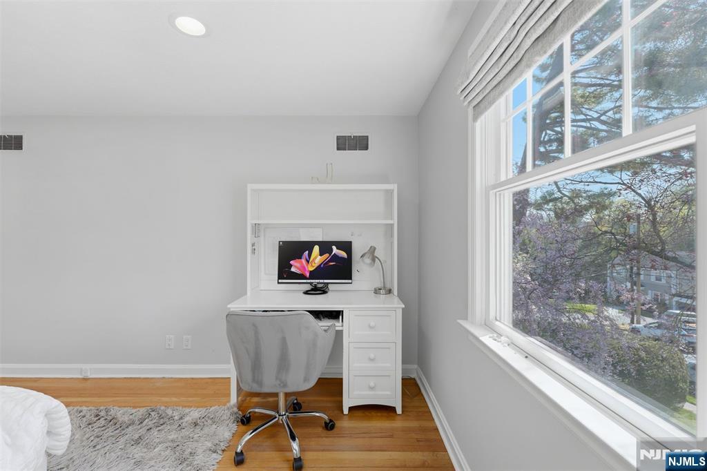 89 Surrey Lane Tenafly, NJ 07670 - Photo 35 of 49 a view of a workspace with furniture and a window