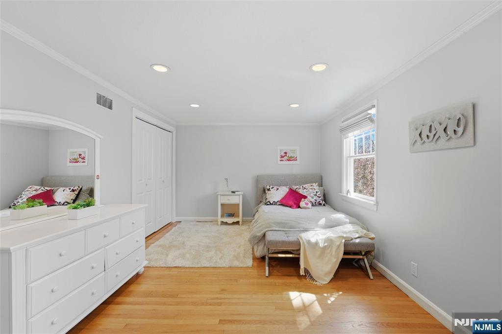 89 Surrey Lane Tenafly, NJ 07670 - Photo 37 of 49 a living room with furniture and a couch