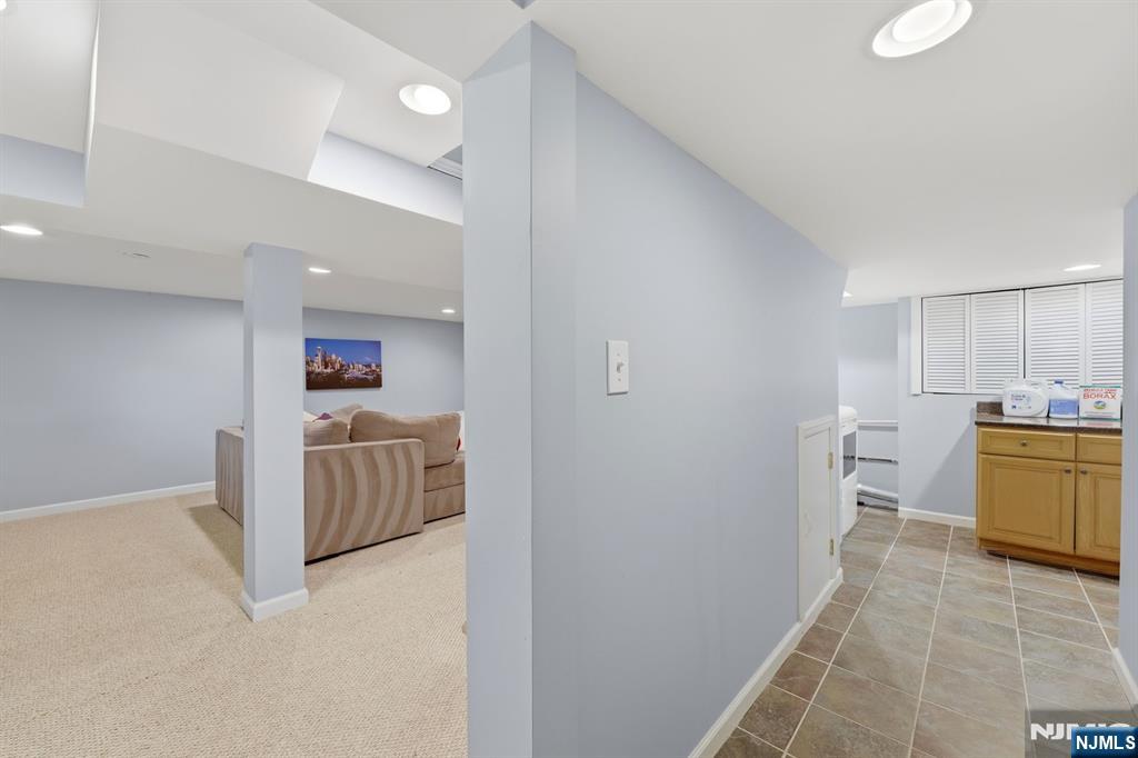 89 Surrey Lane Tenafly, NJ 07670 - Photo 42 of 49 a view of a kitchen with fridge and window