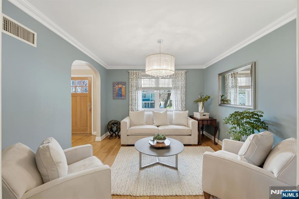 89 Surrey Lane Tenafly, NJ 07670 - Photo 9 of 49 a living room with furniture and a large window