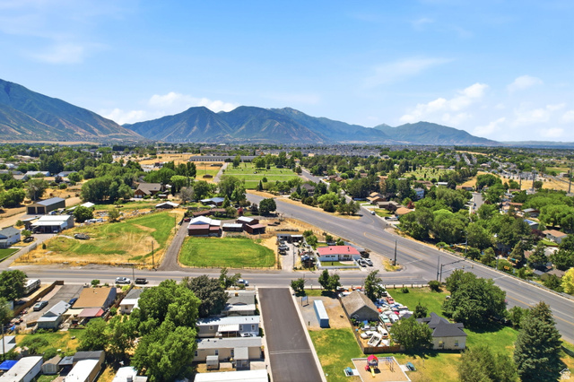 1525 South 400 East, Unit 13 Springville, UT 84663 - Photo 32 of 32 Expansive aerial perspective showcasing a rural-suburban landscape framed by distant mountains