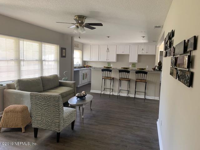 2550 Gayland Road Jacksonville, FL 32218 - Photo 1 of 6 a living room with furniture and a large window