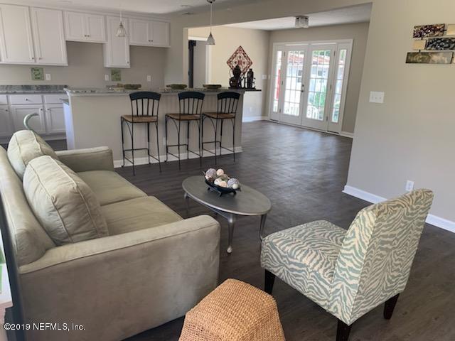 2550 Gayland Road Jacksonville, FL 32218 - Photo 2 of 6 a living room with furniture and wooden floor