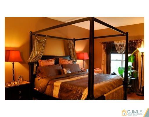 358 Rector Street, Unit STREET 703 Perth Amboy, NJ 08861 - Photo 7 of 10 a black and white photo of a living room