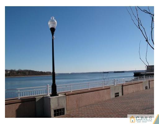 358 Rector Street, Unit STREET 703 Perth Amboy, NJ 08861 - Photo 10 of 10 a view of kitchen with microwave and refrigerator