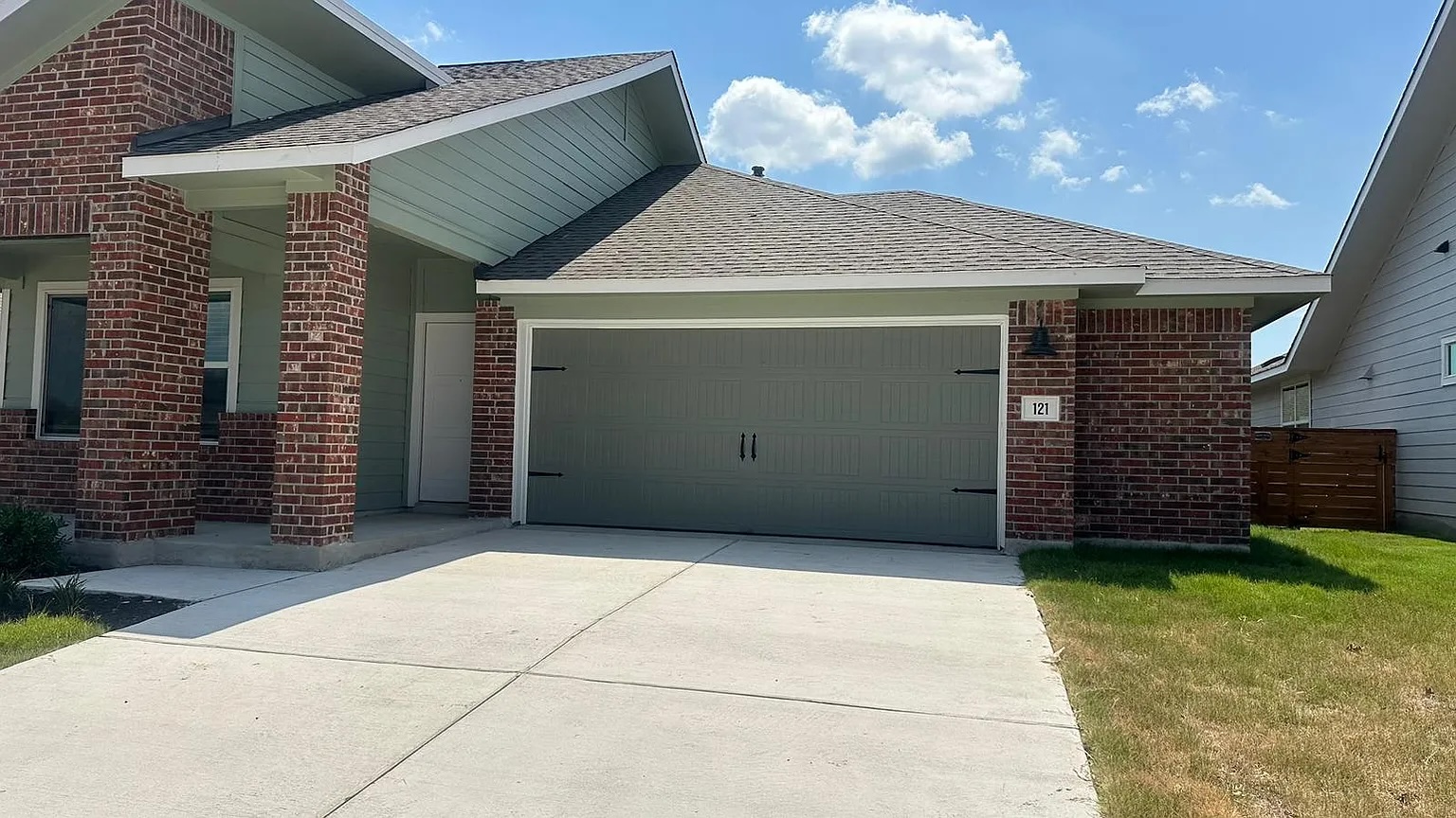 a view of backyard of a house