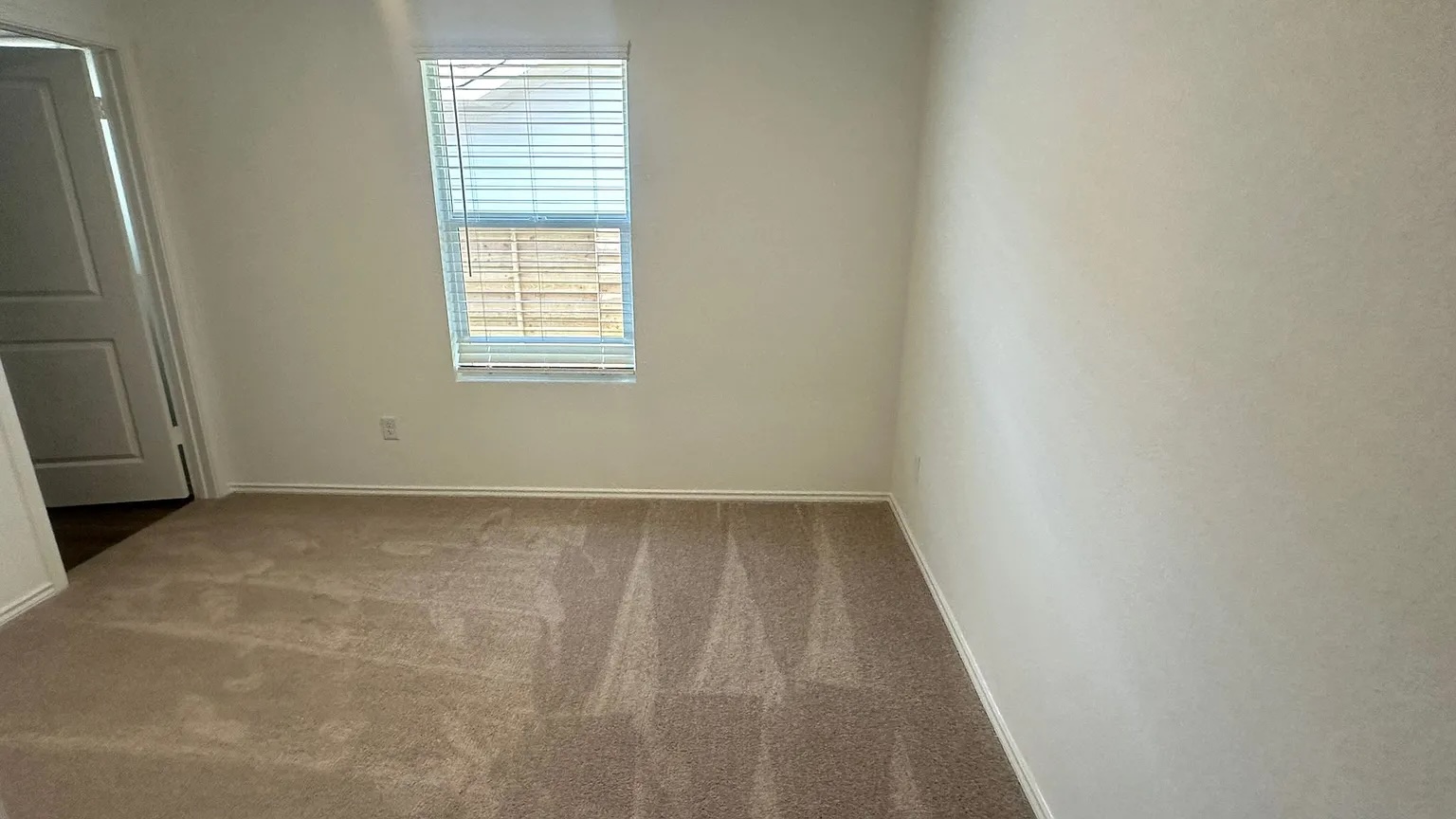 121 Tofalla Kyle, TX 78640 - Photo 10 of 37 a view of a small space with a window