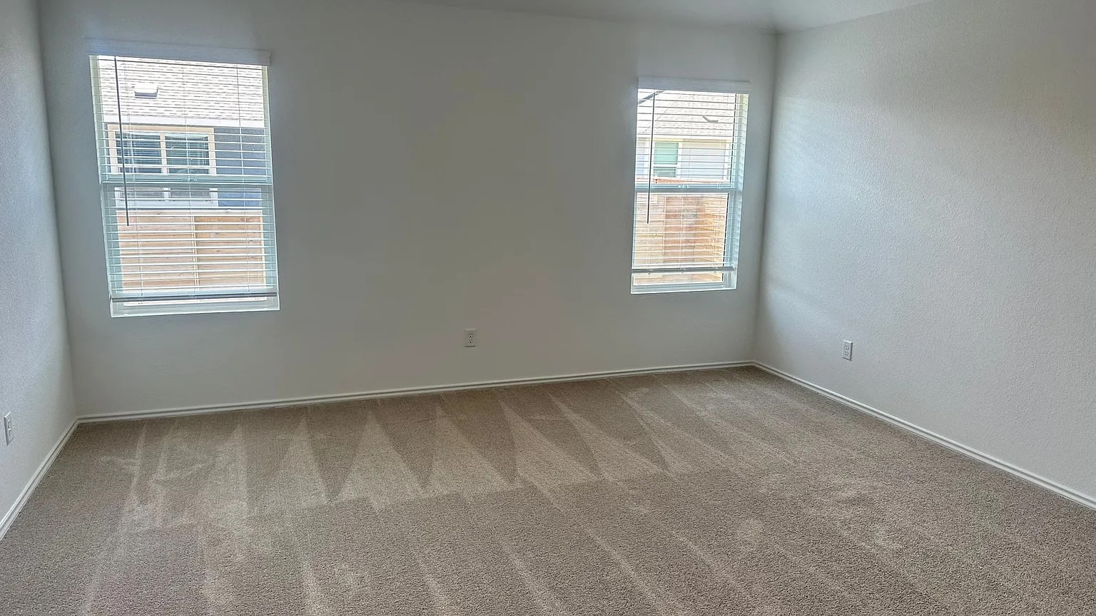 121 Tofalla Kyle, TX 78640 - Photo 11 of 37 an empty room with a window