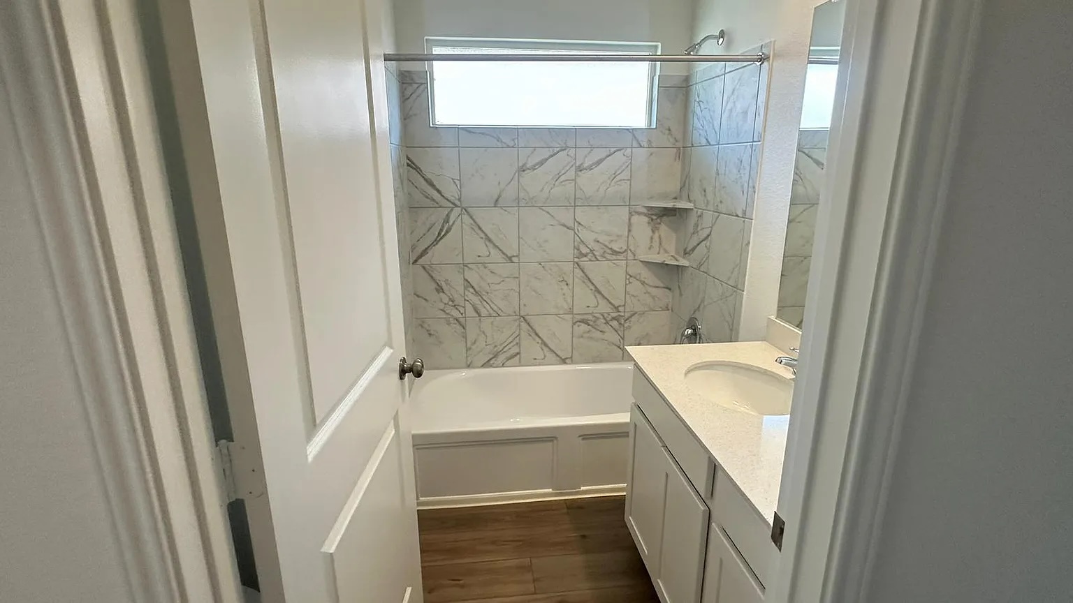 121 Tofalla Kyle, TX 78640 - Photo 12 of 37 a bathroom with a tub and shower