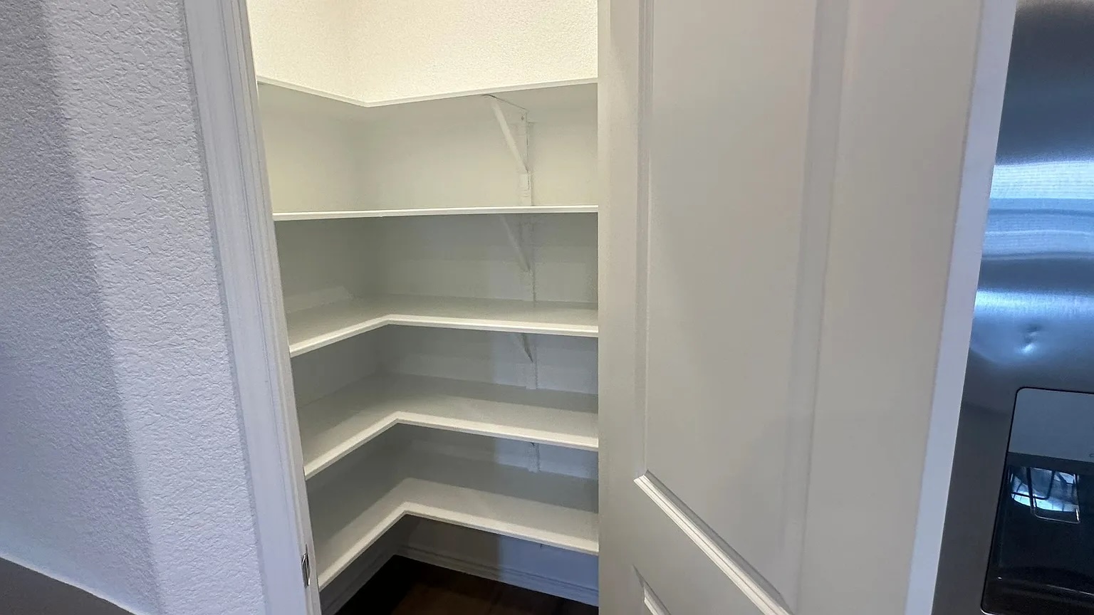 121 Tofalla Kyle, TX 78640 - Photo 16 of 37 a storage room with an empty room