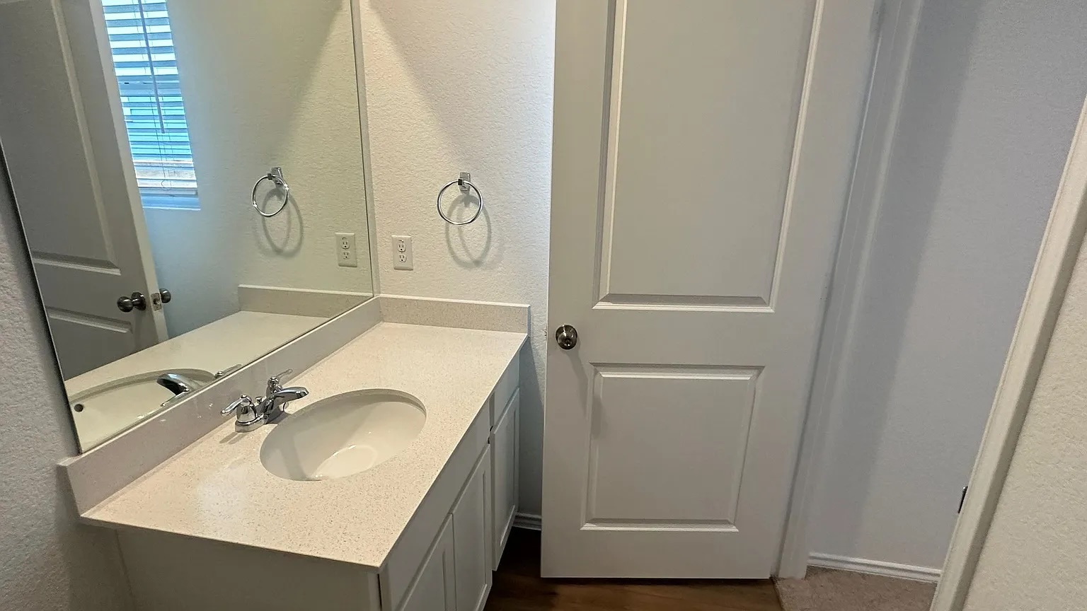 121 Tofalla Kyle, TX 78640 - Photo 22 of 37 a bathroom with a sink and a mirror