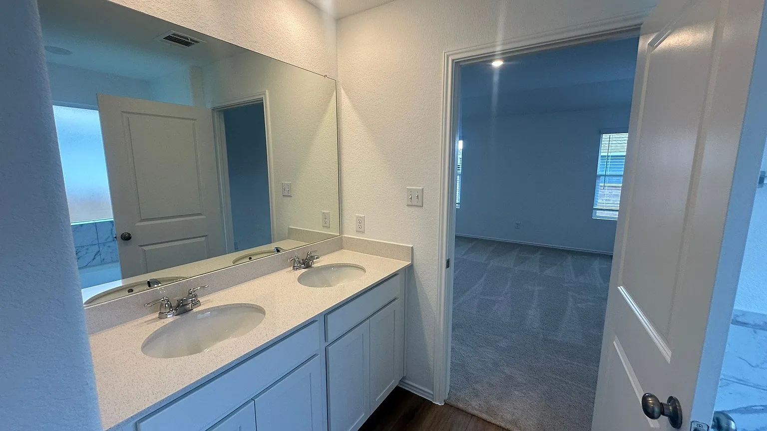 121 Tofalla Kyle, TX 78640 - Photo 25 of 37 a bathroom with a sink and a mirror