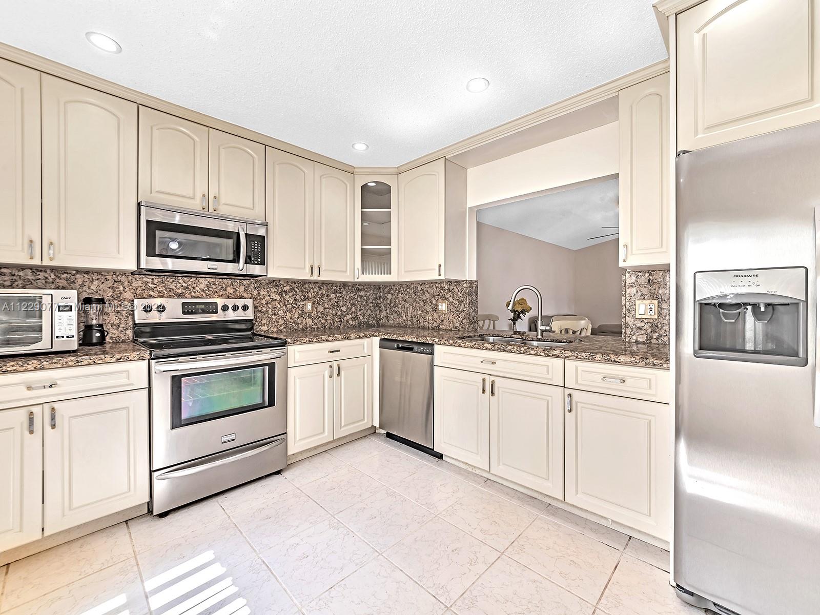 23317 Southwest 55th Avenue, Unit A Boca Raton, FL 33433 - Photo 1 of 70