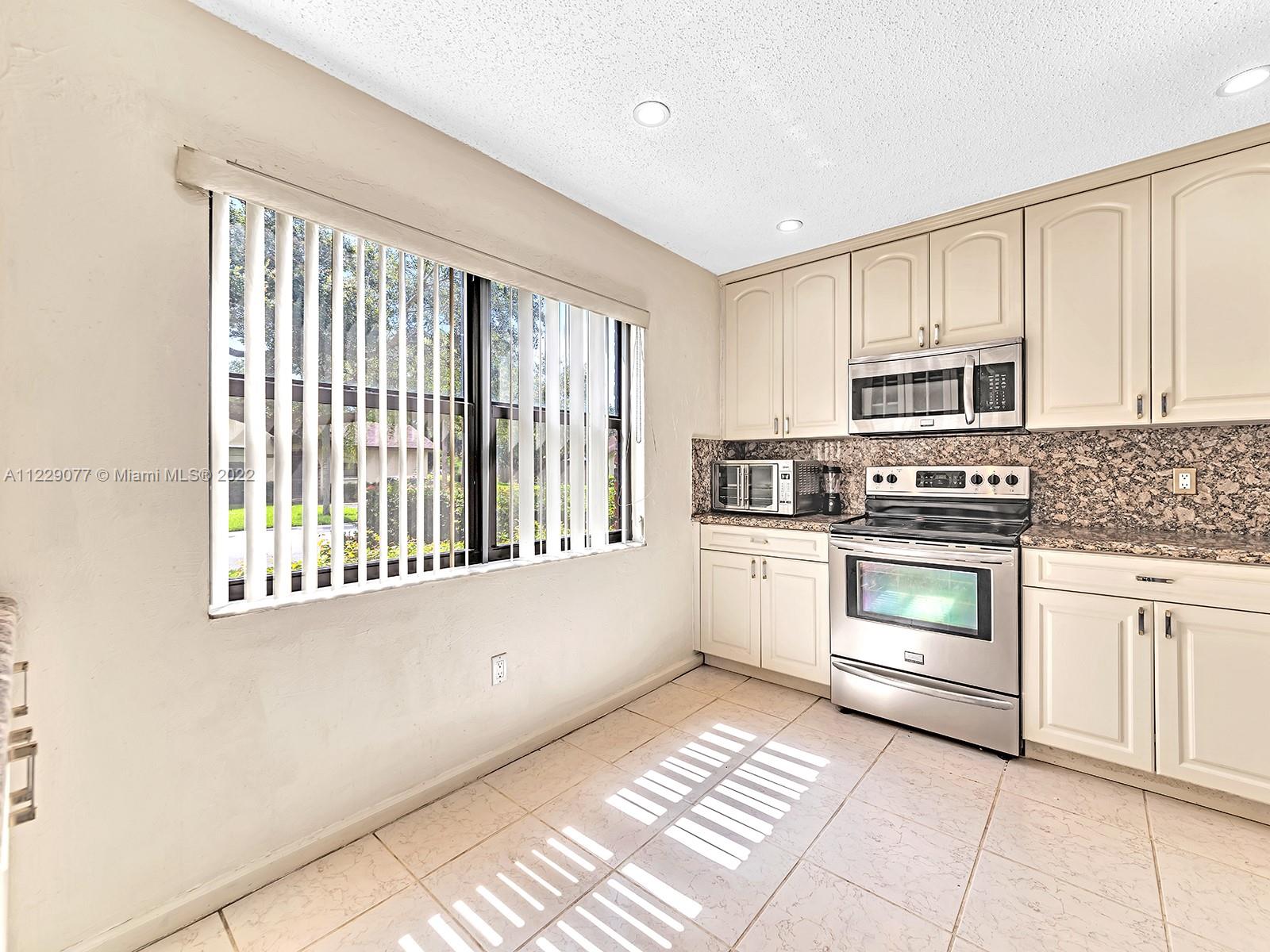 23317 Southwest 55th Avenue, Unit A Boca Raton, FL 33433 - Photo 3 of 70