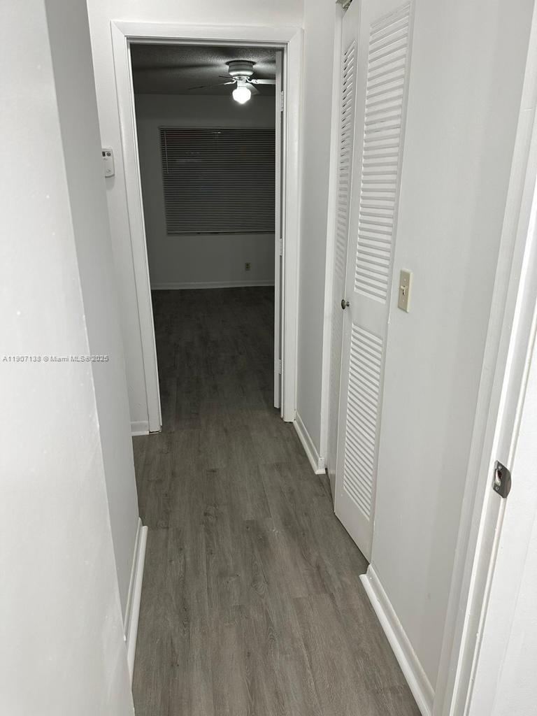 2259 Linton Ridge Circle, Unit G4 Delray Beach, FL 33444 - Photo 16 of 25 a view of walk in closet