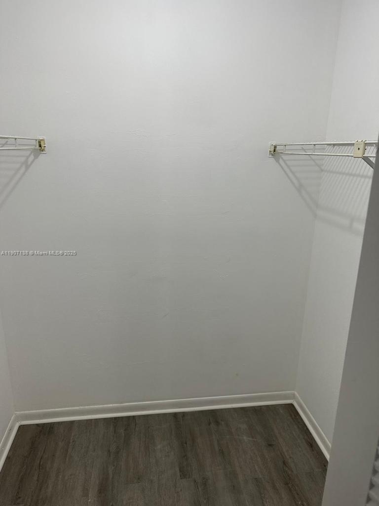 2259 Linton Ridge Circle, Unit G4 Delray Beach, FL 33444 - Photo 22 of 25 a view of small space with racks on the wall