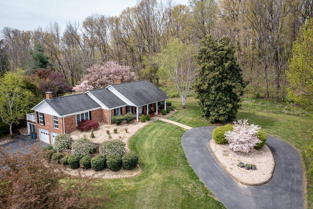 2833 Shutterlee Mill Road Staunton, VA 24401 - Photo 1 of 70 an aerial view of a house with a yard