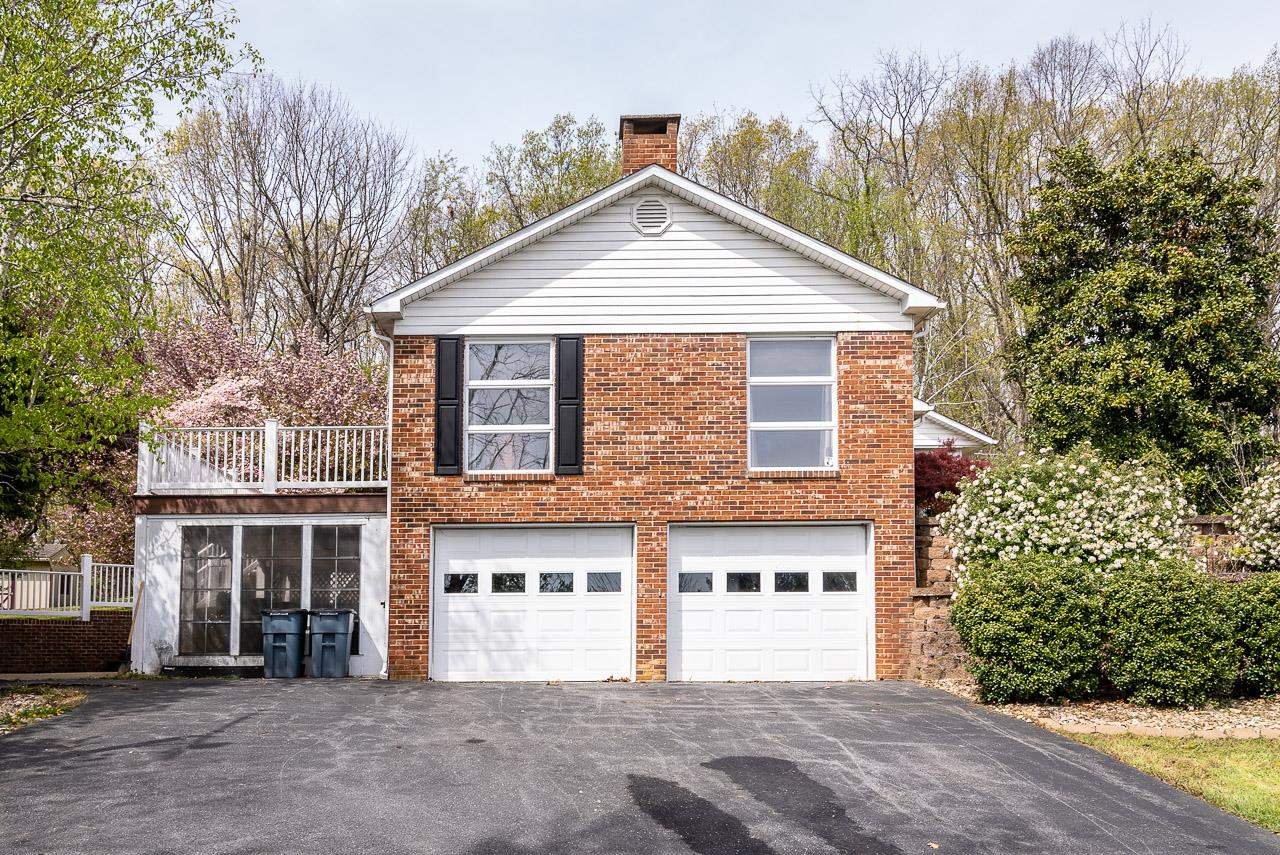 2833 Shutterlee Mill Road Staunton, VA 24401 - Photo 45 of 70 a front view of a house with a yard and garage