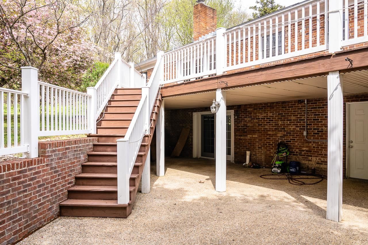 2833 Shutterlee Mill Road Staunton, VA 24401 - Photo 46 of 70 a view of a house with stairs and wooden fence