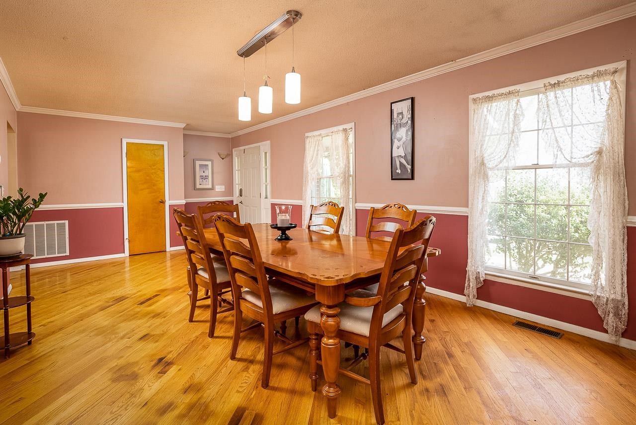 2833 Shutterlee Mill Road Staunton, VA 24401 - Photo 5 of 70 a view of a dining room with furniture and wooden floor