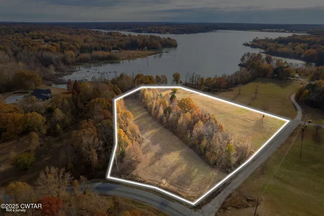 a view of swimming pool from a lake