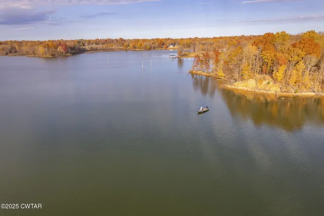 a view of an ocean and a mountain