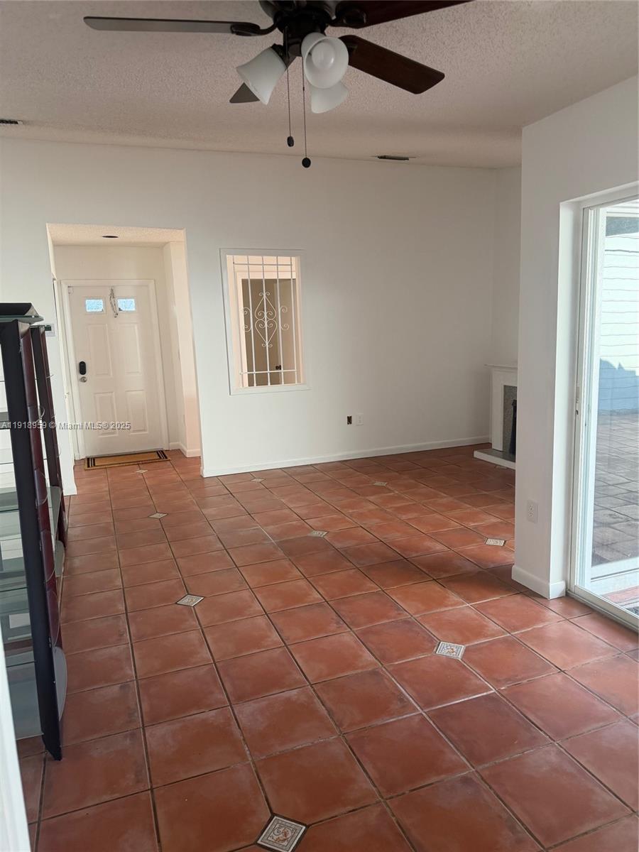 13773 Southwest 147th Cir Lane, Unit 121 Miami, FL 33186 - Photo 8 of 16 a view of an empty room with a window