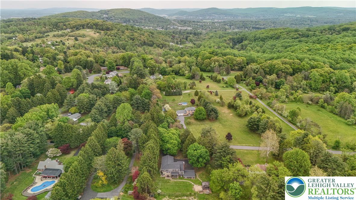 2242 Church Road Bethlehem, PA 18015 - Photo 63 of 74 an aerial view of residential houses with outdoor space and trees