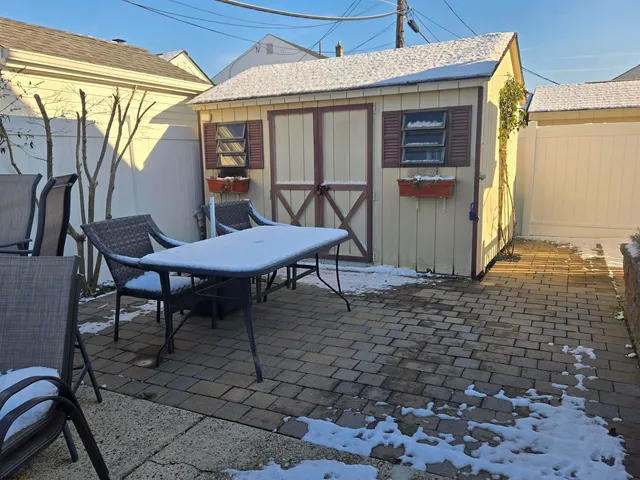 a view of a porch with furniture