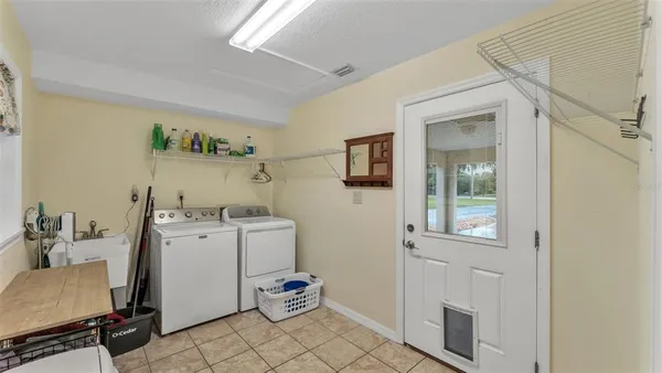 a white refrigerator freezer and a stove top oven