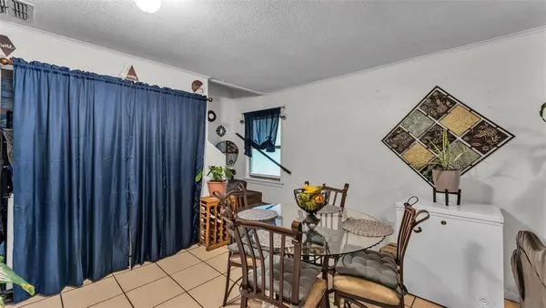 a kitchen with stainless steel appliances a stove a sink and a refrigerator