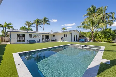 swimming pool with outdoor seating