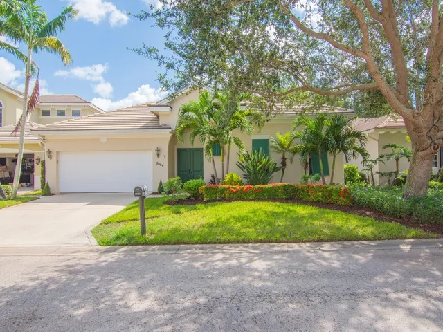 a view of a lake with a building in the background