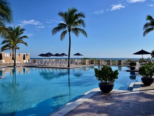 a view of a lake with a yard