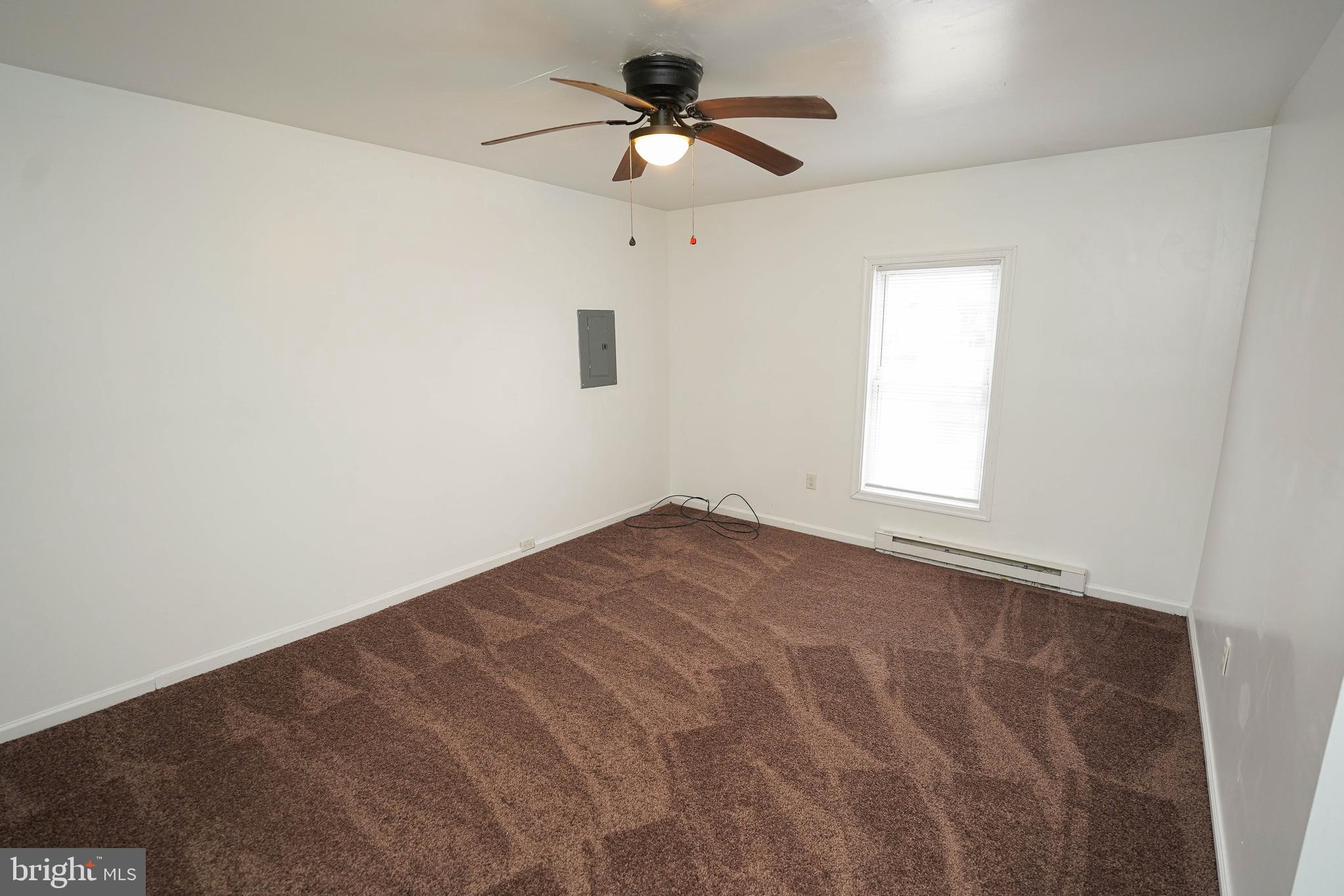 417 Walnut Street, Unit 2 Pocomoke City, MD 21851 - Photo 14 of 33 a view of an empty room with a window