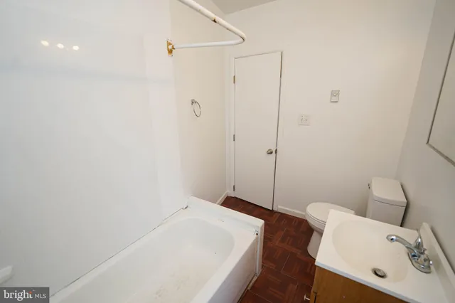 a bathroom with a sink and shower