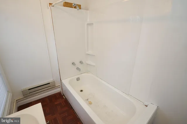 a bathroom with a bathtub