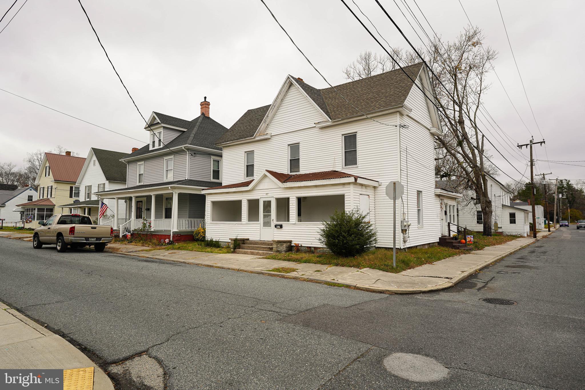 417 Walnut Street, Unit 2 Pocomoke City, MD 21851 - Photo 3 of 33 a view of multiple houses with a street
