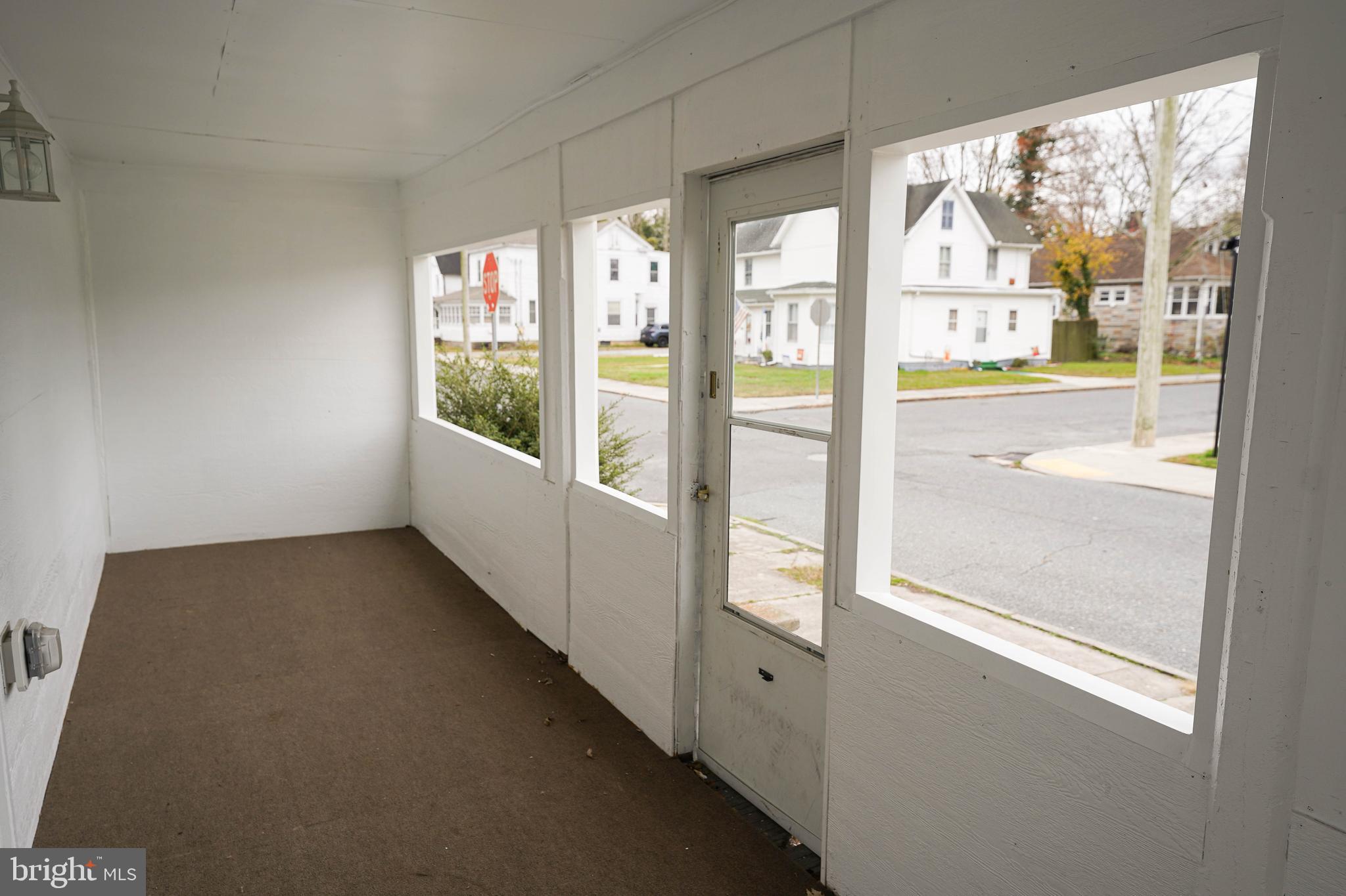 417 Walnut Street, Unit 2 Pocomoke City, MD 21851 - Photo 7 of 33 a view of an empty room and window