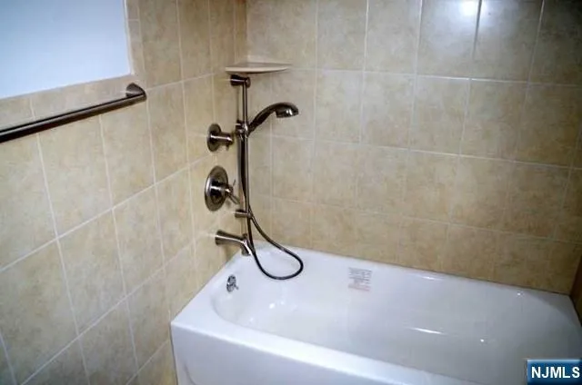 a bathroom with a toilet and a sink