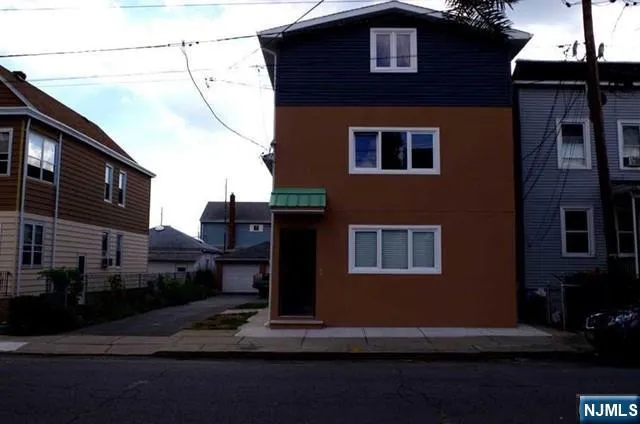 a view of a street with cars