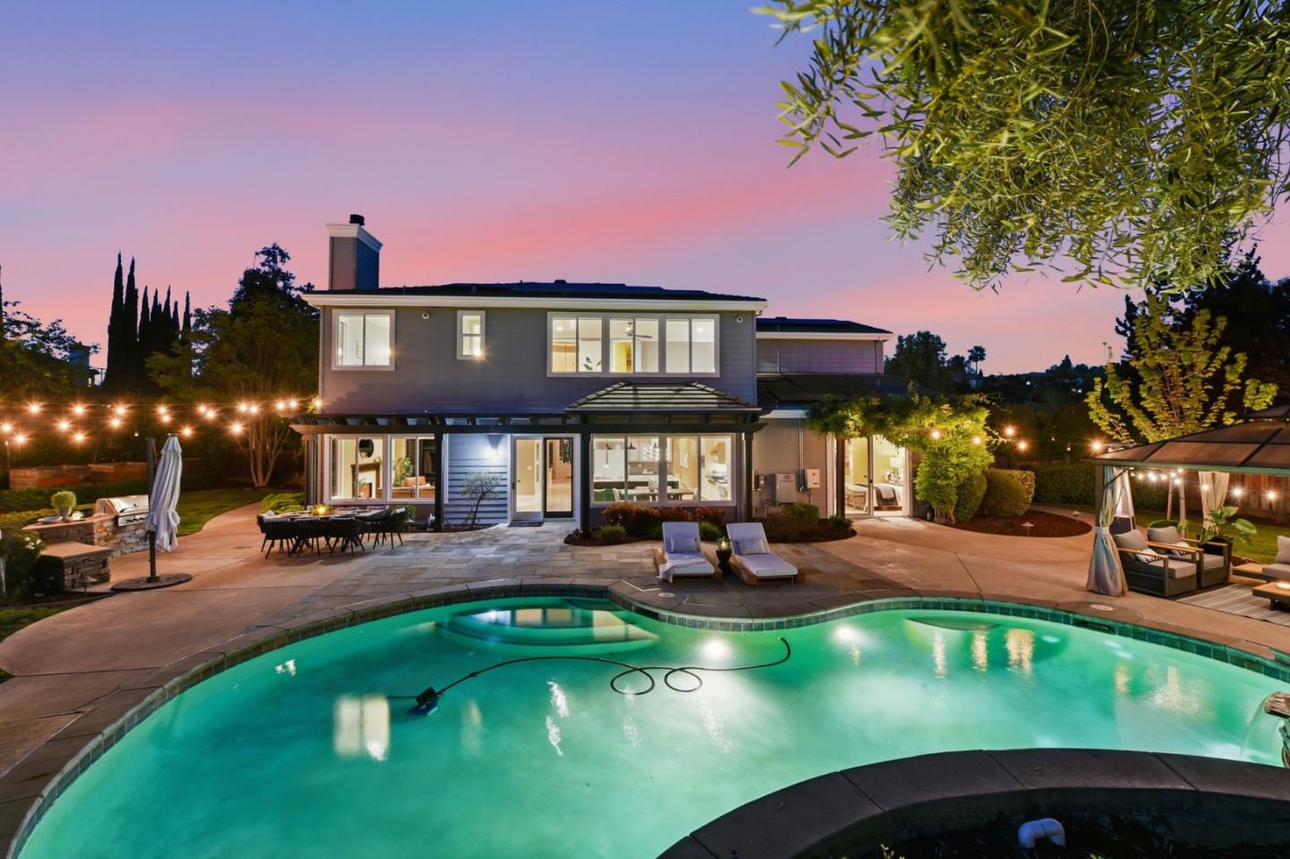 2566 Bentley Ridge Drive San Jose, CA 95138 - Photo 17 of 101 a front view of a house with swimming pool and sitting area