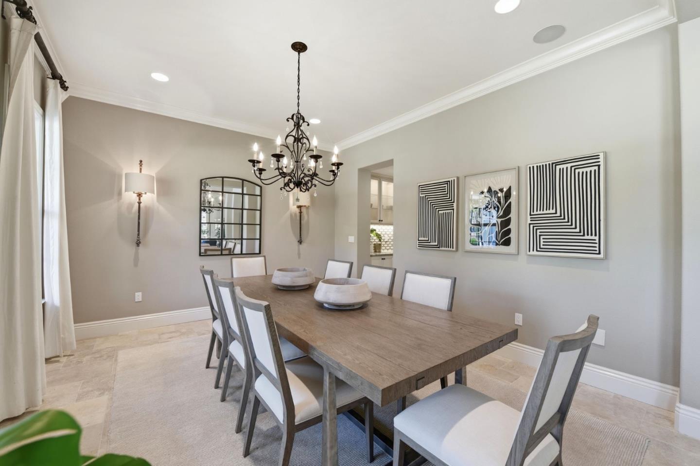 2566 Bentley Ridge Drive San Jose, CA 95138 - Photo 25 of 101 a view of a dining room with furniture and chandelier