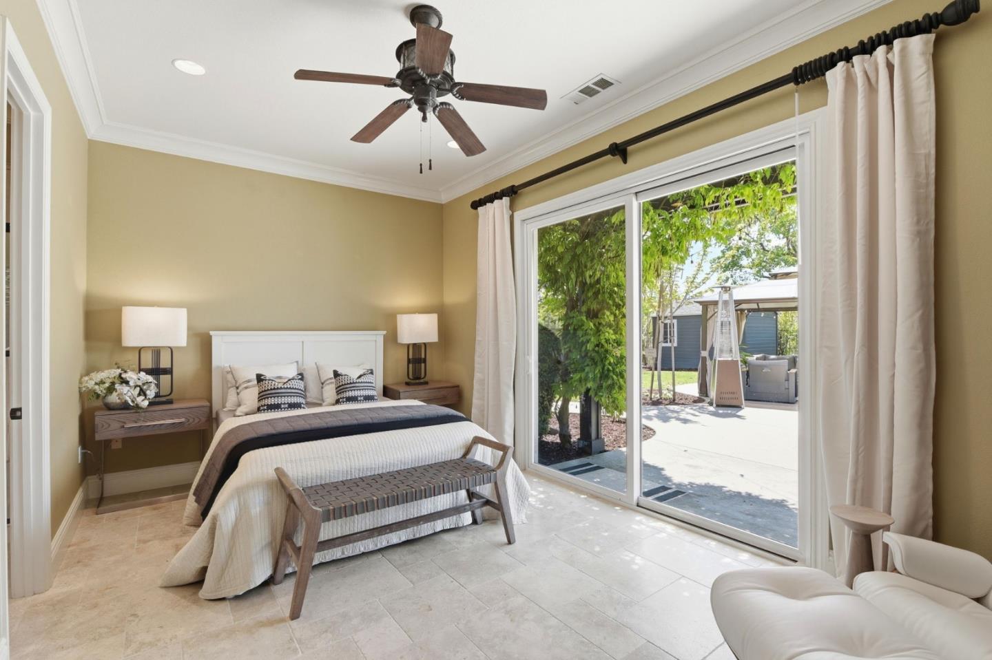 2566 Bentley Ridge Drive San Jose, CA 95138 - Photo 52 of 101 a bedroom with a bed couch and large window